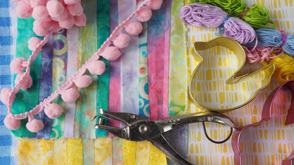 Easter Garland made with fabric created by using scraps and Mod Podge.  createwithclaudia - #easter #craft 