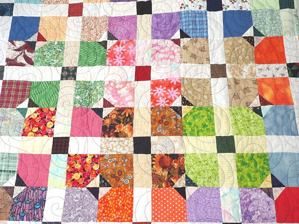 Make your quilting fun with this liberating and unique way of making a scrap quilt.  It's easy with the Paper Bag Method. Free quilt pattern included. - createwithclaudia.com
