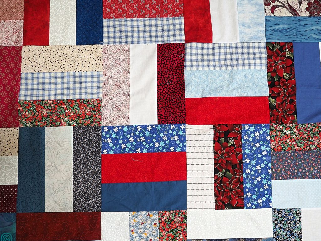 Make your quilting fun with this liberating and unique way of making a scrap quilt.  It's easy with the Paper Bag Method. Free quilt pattern included. - createwithclaudia.com