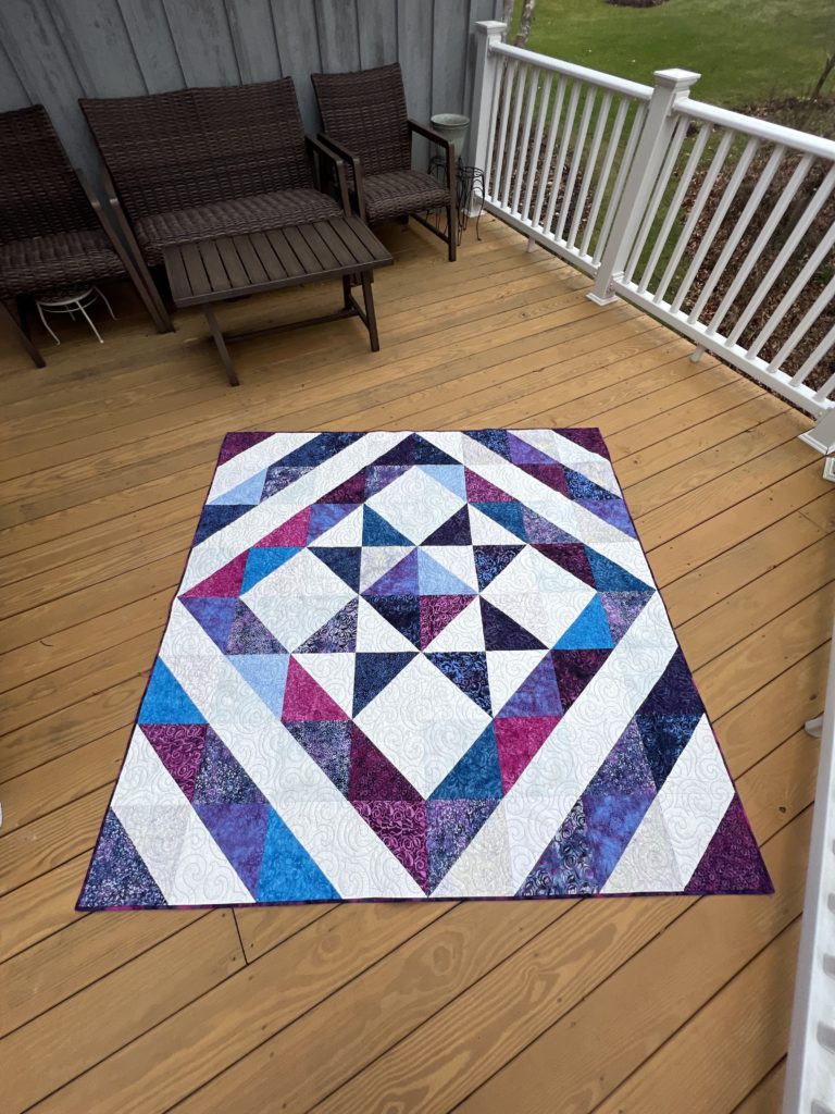 Super Easy Quilt Made with One 10" Precut Pack and a Few Yards of Fabric
