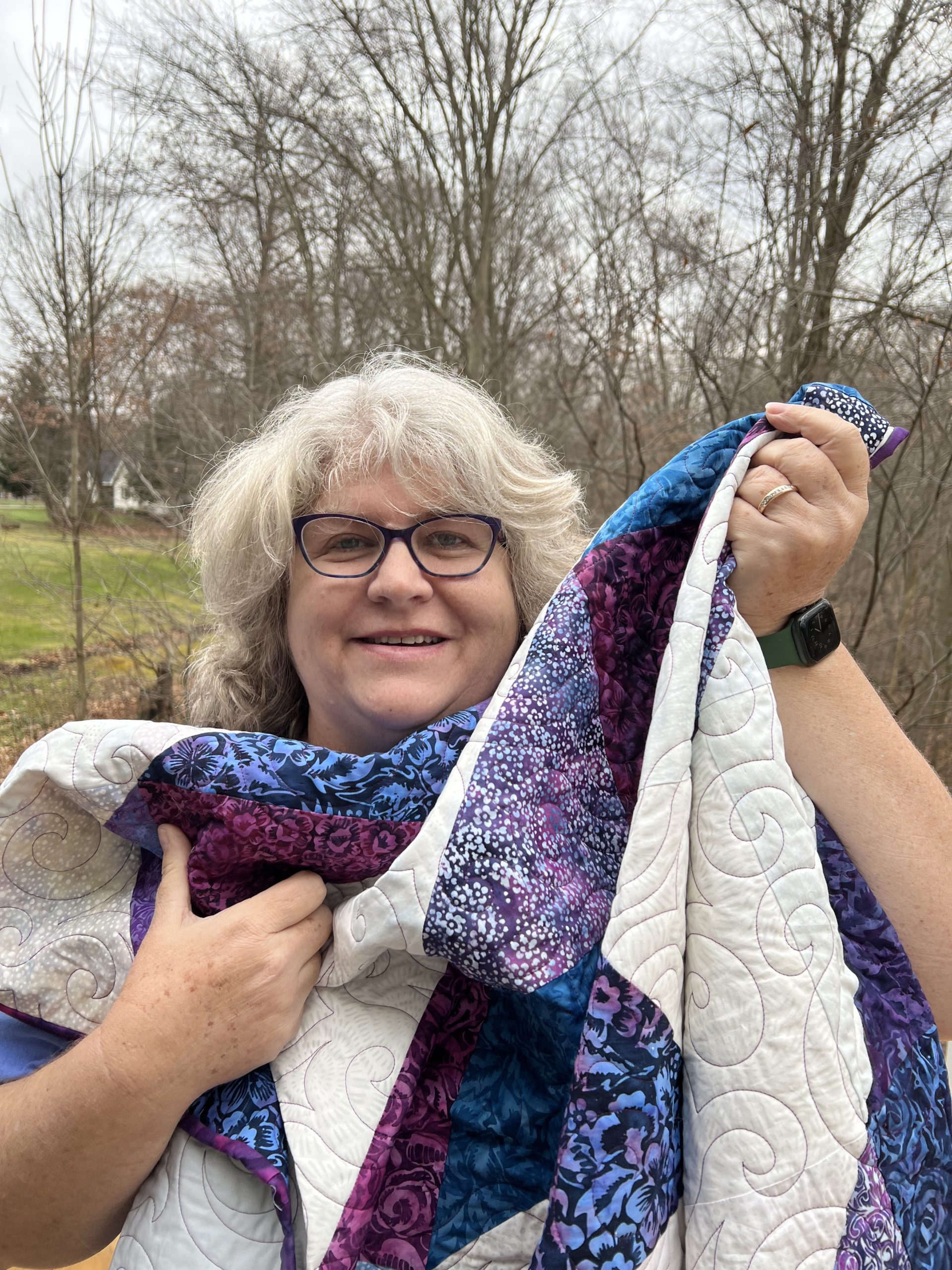 Super Easy Quilt Made with One 10" Precut Pack and a Few Yards of